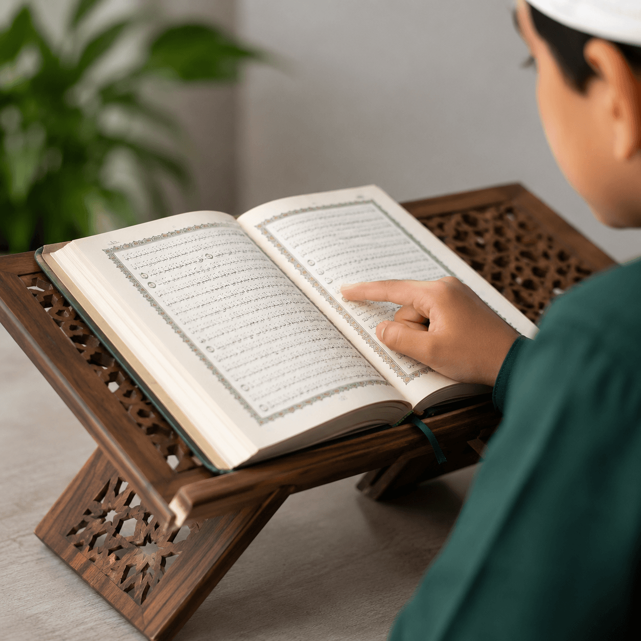 Close-up of student learning fluent Quran reading with finger guiding through authentic Uthmani script