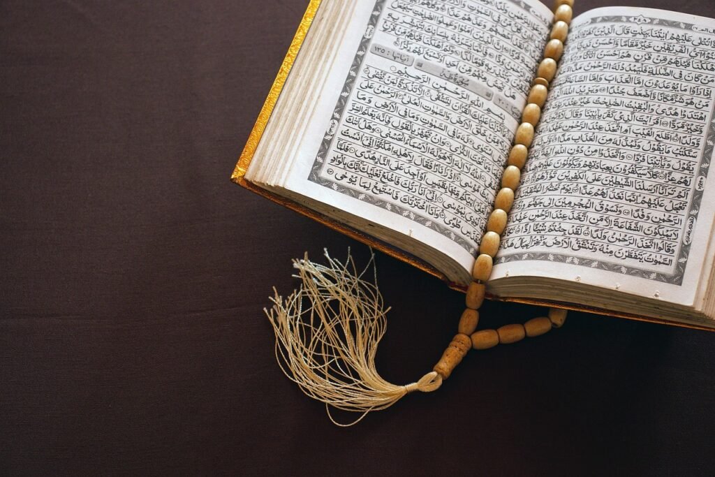 Muslim student learning Quran online with a teacher