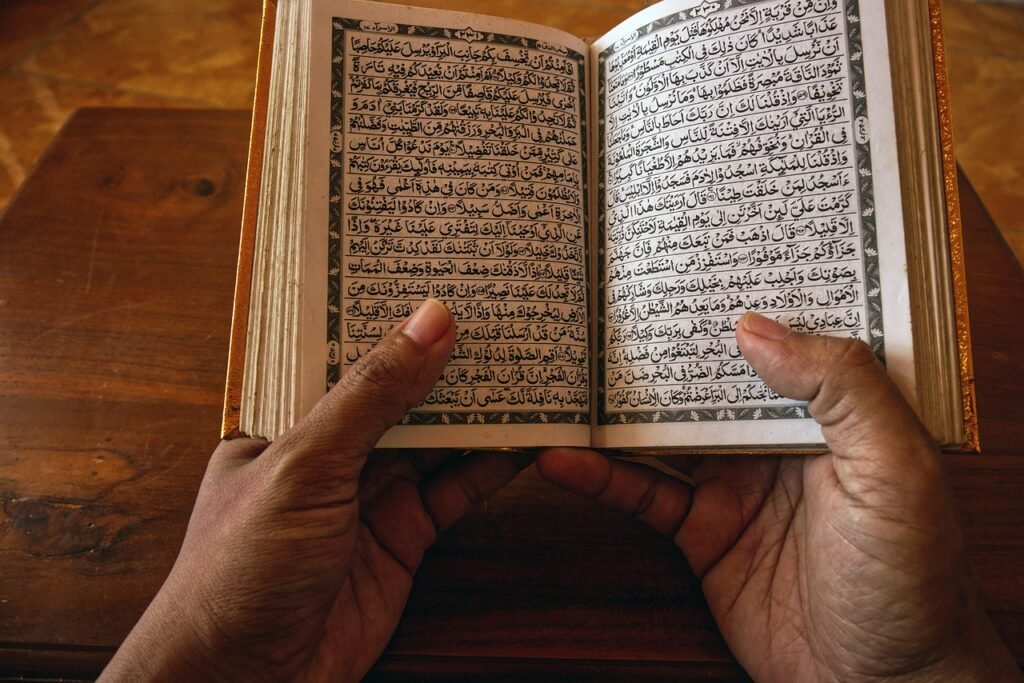 Muslim child learning Quran online with a teacher