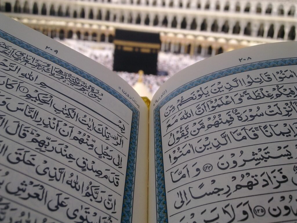 Muslim student learning Quran online with a teacher